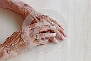 The hands of a very old woman