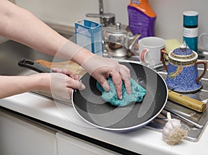 Hands Washing Dirty Dish Ware