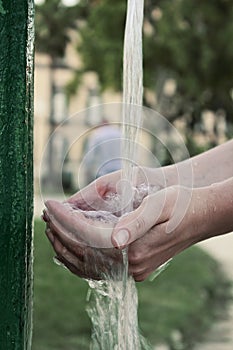 Hands and water