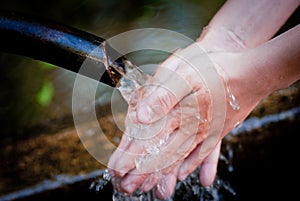 Hands and water