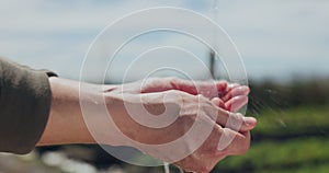 Hands, water and washing clean on field as garden worker for sustainability hygiene, agriculture or quality assurance