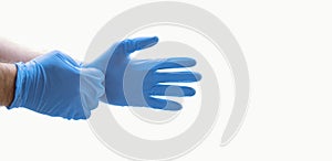 Hands wearing blue medical latex gloves Protection against flu, virus and coronavirus. Health care and surgical concept. Correct