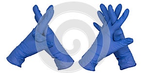Hands wearing blue nitrile examination gloves steepled or interlaced fingers