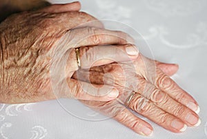 Hands with wedding rings