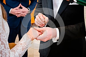 hands, wedding rings and marriage vows