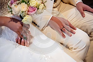 hands, wedding rings and marriage vows