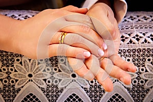 hands, wedding rings and marriage vows