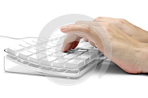 Ruky na biely počítač klávesnica 