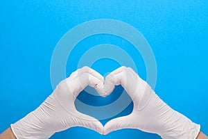 Hands In White Protective Gloves Shape Heart