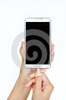 Hands of woman connects plug of charger mobile phone or smartphone charging on white background