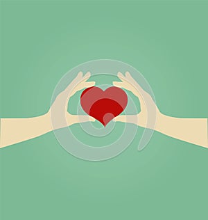 Hands of Woman Holding Red Heart