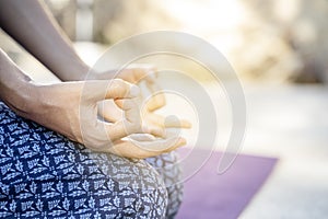 Hands woman meditating at sunset Yoga gesture