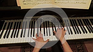 Hands of woman playing slow music on piano  FDV