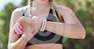 Hands, woman and smart watch with fitness for time check or navigate route to jog, distance and notification. Runner