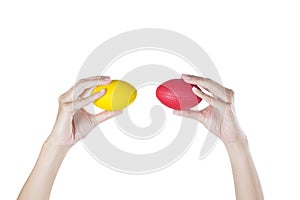 Hands of a woman squeezing a stress balls