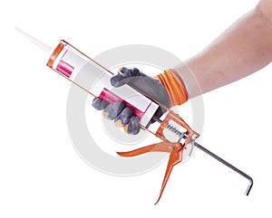 Hands work gloves hold sealant gun