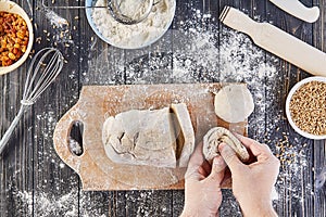 Hands working with dough preparation recipe bread, pizza or pie