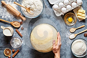 Hands working with dough preparation recipe bread, pizza or pie making ingridients