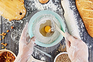 Hands working with dough preparation recipe bread, pizza or pie making ingridients, food flat lay on kitchen table background