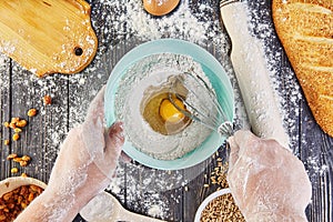 Hands working with dough preparation recipe bread, pizza or pie making ingridients, food flat lay on kitchen table background