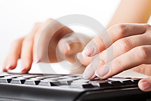 Hands writting on computer