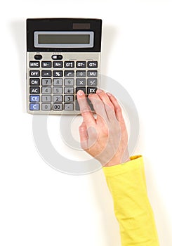Hands in yellow jacket and black calculator