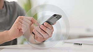 Hands of Young Man Using Smartphone, Close Up