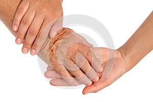 Hands of young and senior women