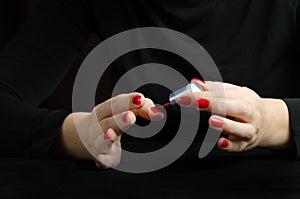 Hands of Young Woman Making Manicure