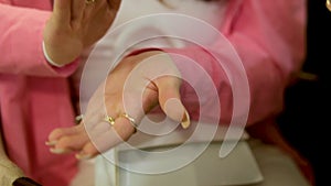 hands of a young woman of a young girl Applause clap hands close-up French manicure long nails well-groomed hands gold