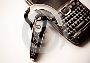 Handsfree bluetooth headset and mobile phone