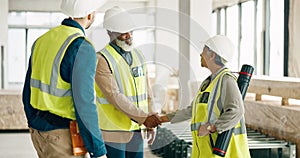 Handshake, architecture and engineering team shaking hands with a project development designer in a building. Global