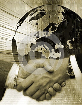 Handshake on background drawing globe