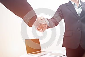 Handshake business agreement of partner business man and woman