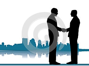Handshake of a business deal with city skyline