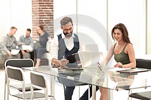 Handshake business partners at the office Desk