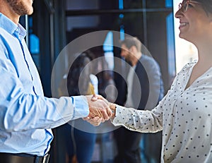 Handshake, business people in meeting and partnership, trust in team and onboarding or hiring. Professional agreement