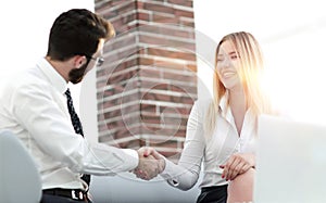 Handshake business people in the office