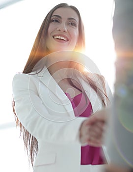 Handshake, business woman and client