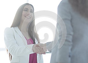Handshake, business woman and client