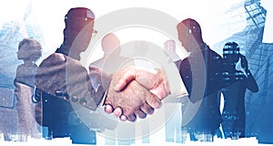 Handshake in city, business partnership