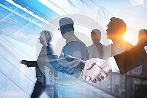 Handshake in city, business team concept