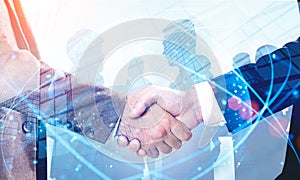 Handshake in city, global network