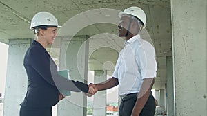 Handshake on construction site