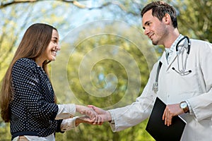 Handshake of a doctor and patient