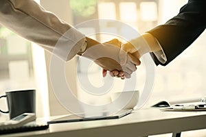 Handshake gesturing people connection deal concept, Successful making deal with female business partner