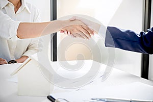 Handshake after good cooperation, Real estate broker residential