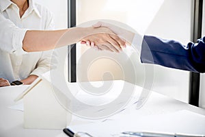 Handshake after good cooperation, Real estate broker residential photo