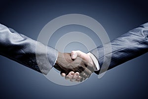 Handshake - Hand holding on black
