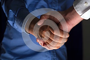 Handshake Handshaking in dark with low light